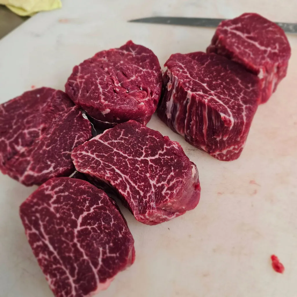 Filet mignon cut being prepared in the kitchen